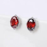 Wholesale geometric zircon earrings with large oval center stones and 925 silver needles from JuneJewelry.com – luxury bridal fashion jewelry for bulk purchase.